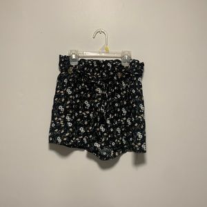 Black floral shorts with belt